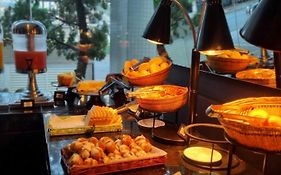 Paraíso Suítes by Charlie